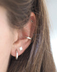 Hand Engraved Star Huggie Hoop Earrings in Sterling Silver