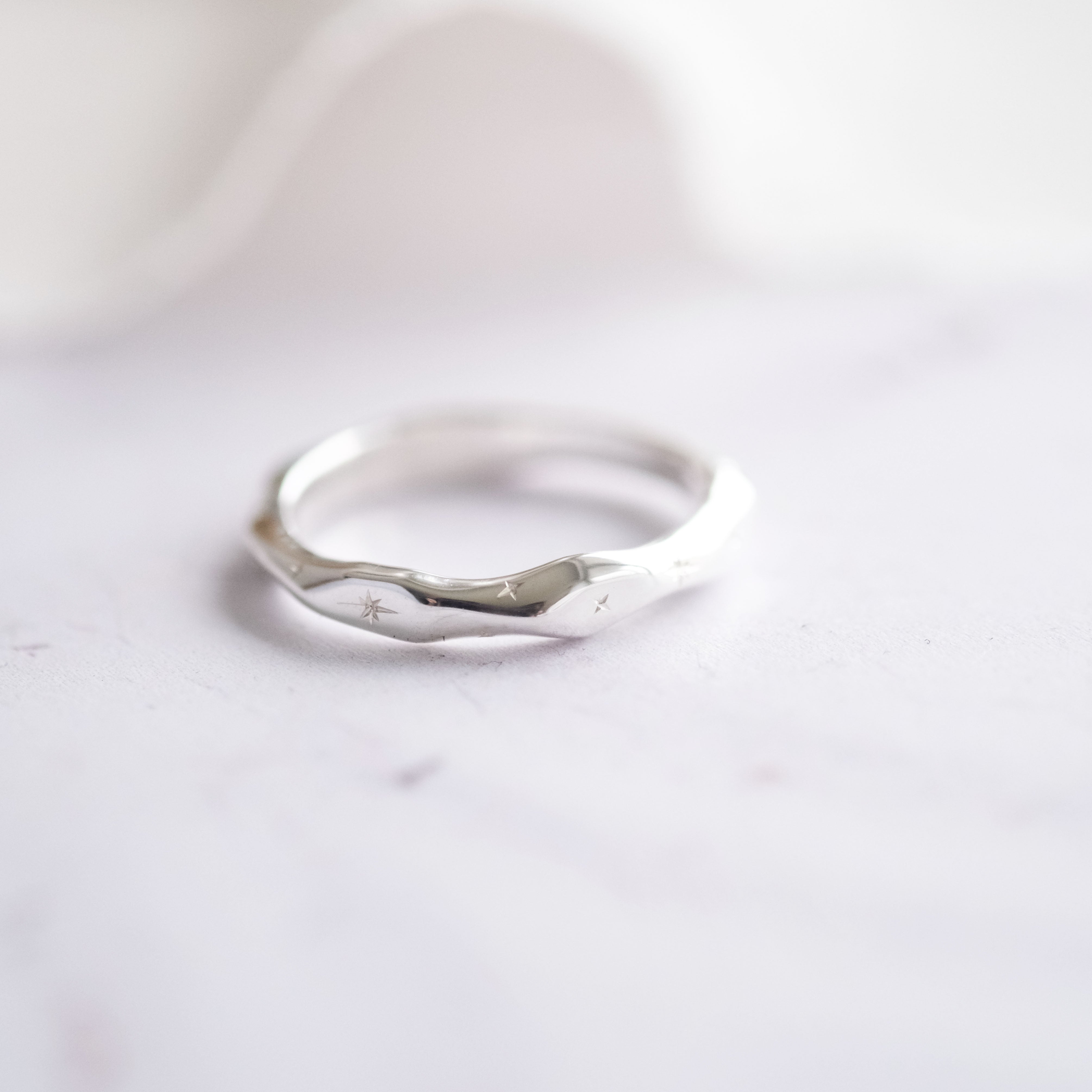 Star Engraved Wave Ring