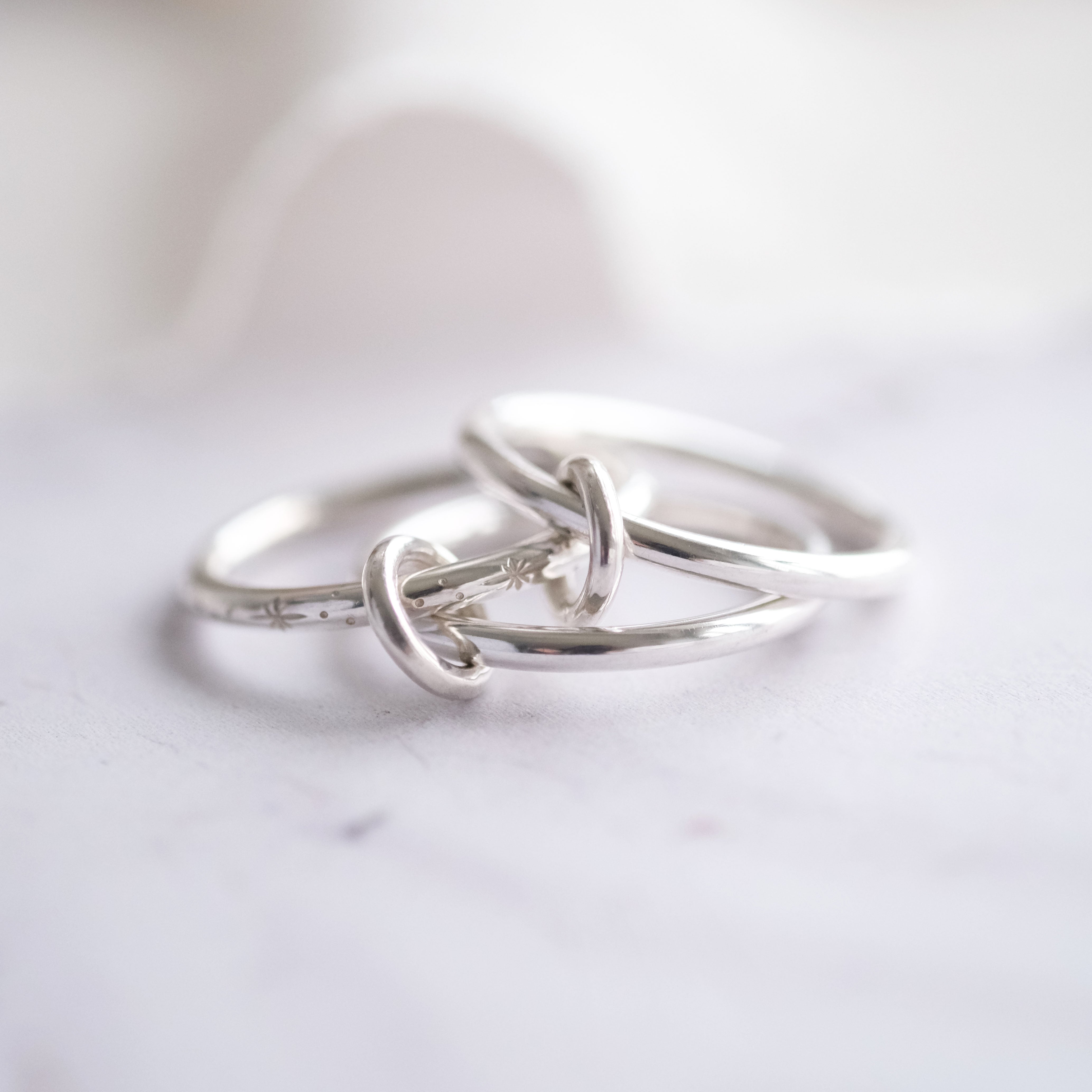 Star Engraved Interlocking Spinner Ring