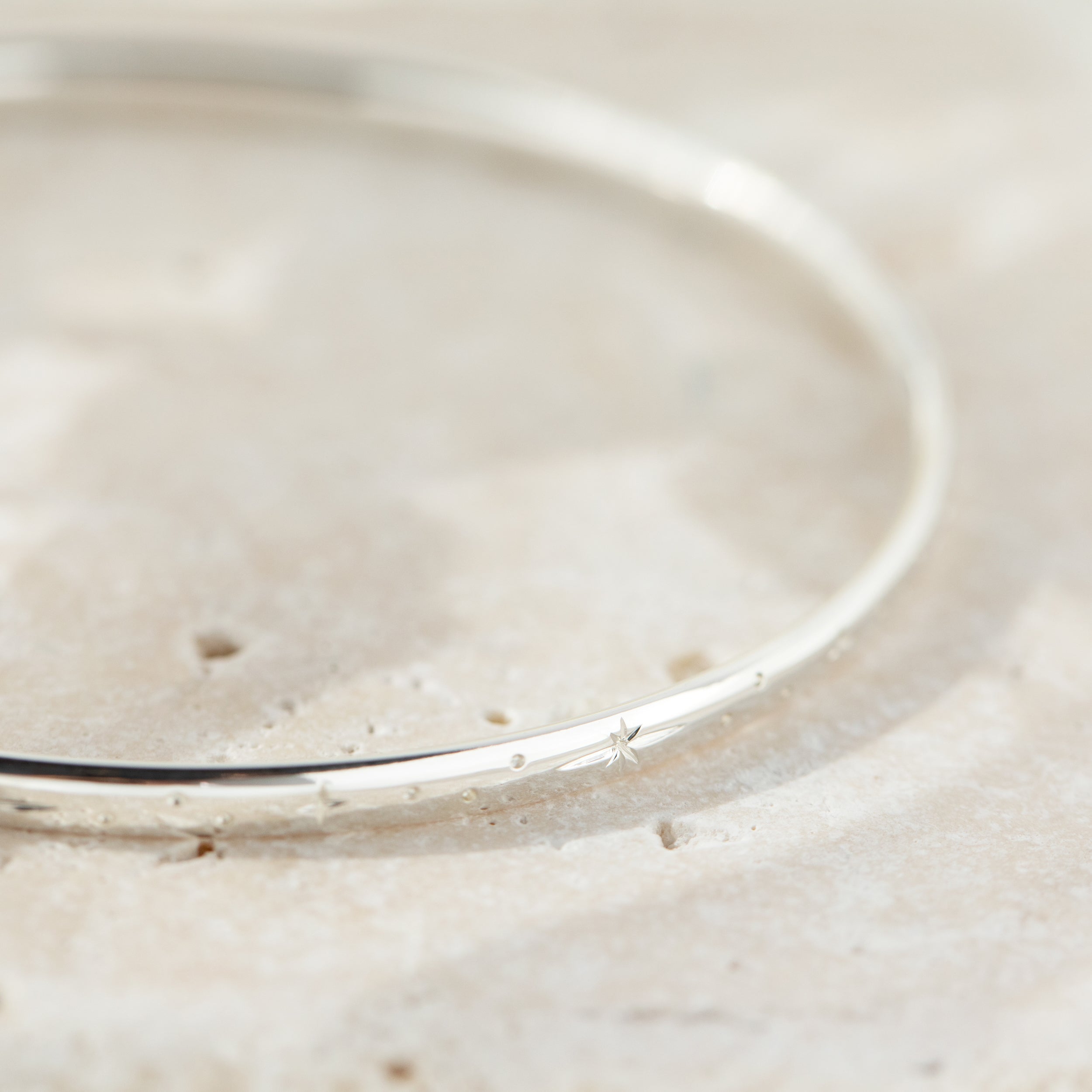 Hand Engraved Star Bangle in Sterling Silver