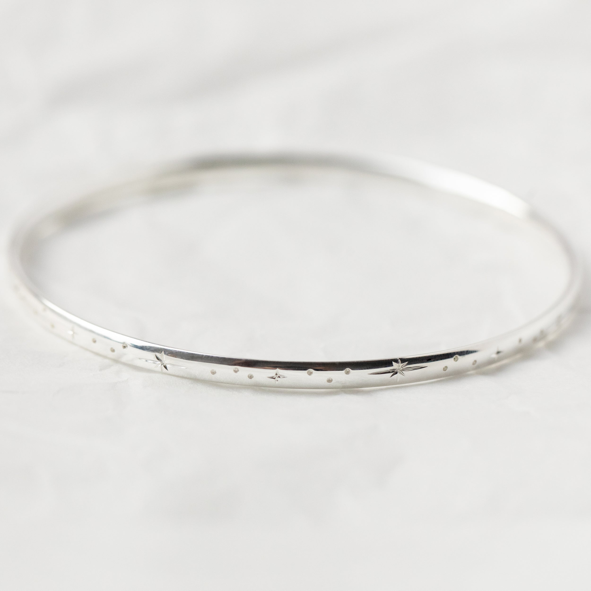 Hand Engraved Star Bangle in Sterling Silver