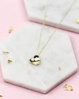 Solid 9 carat yellow gold concave heart necklace