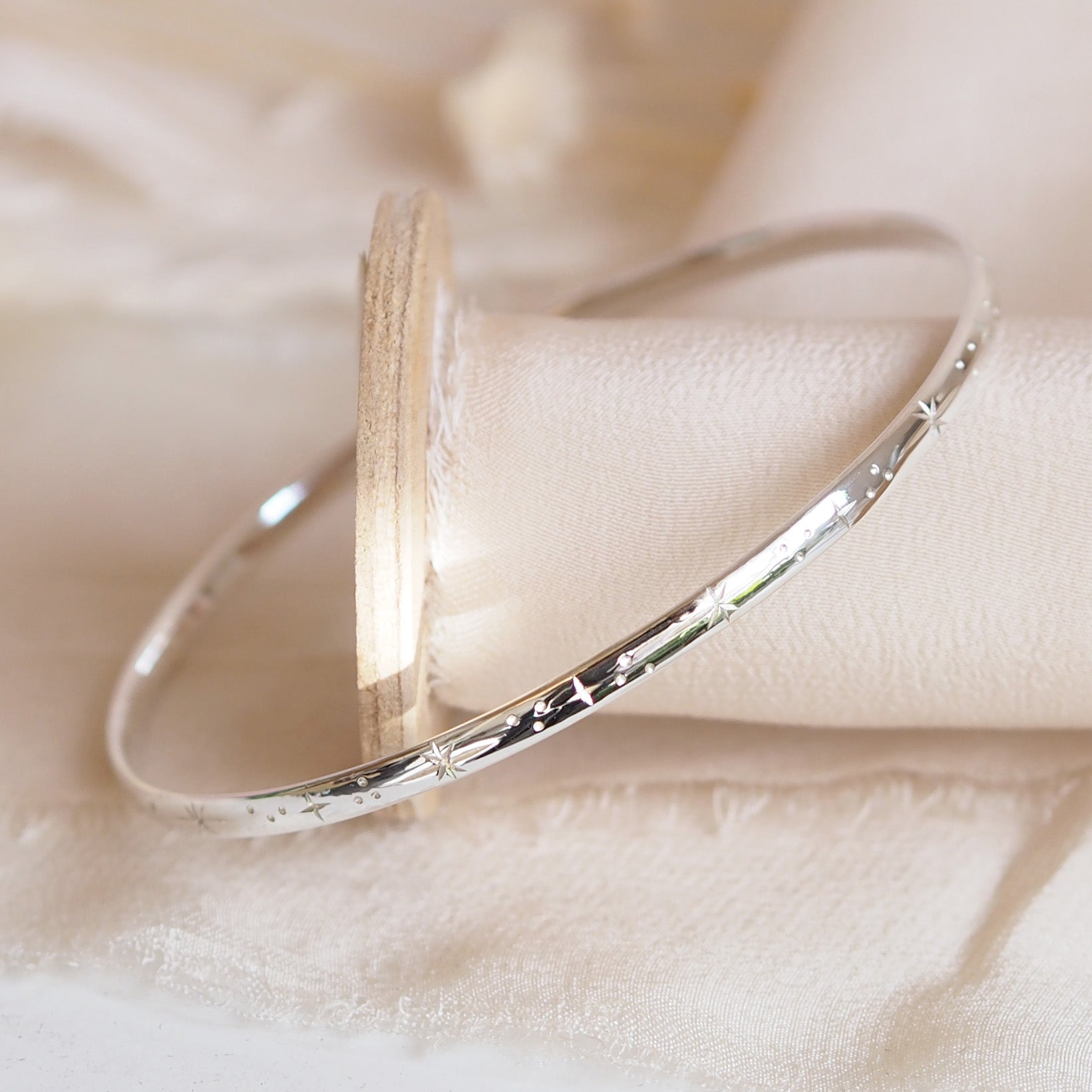 Hand Engraved Star Bangle in Sterling Silver