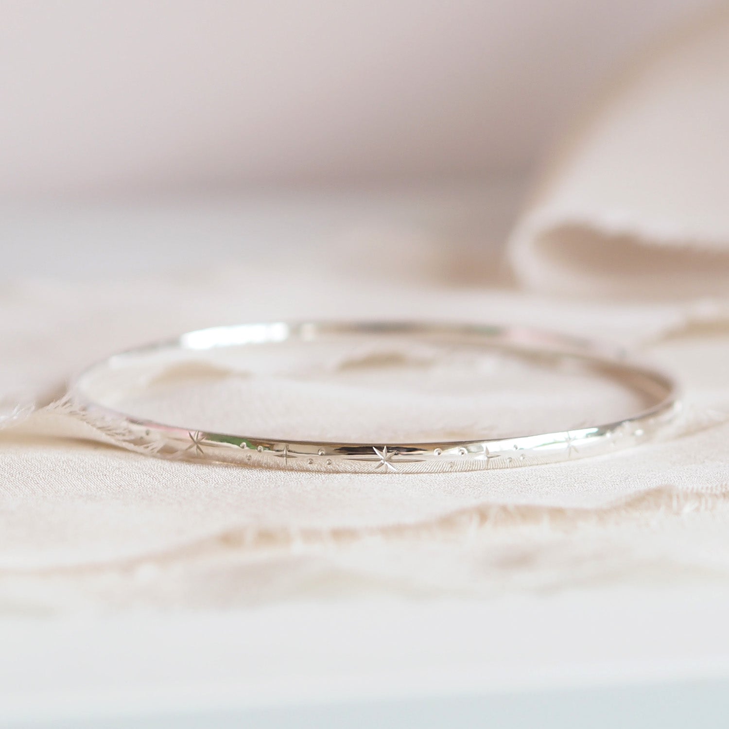 Hand Engraved Star Bangle in Sterling Silver