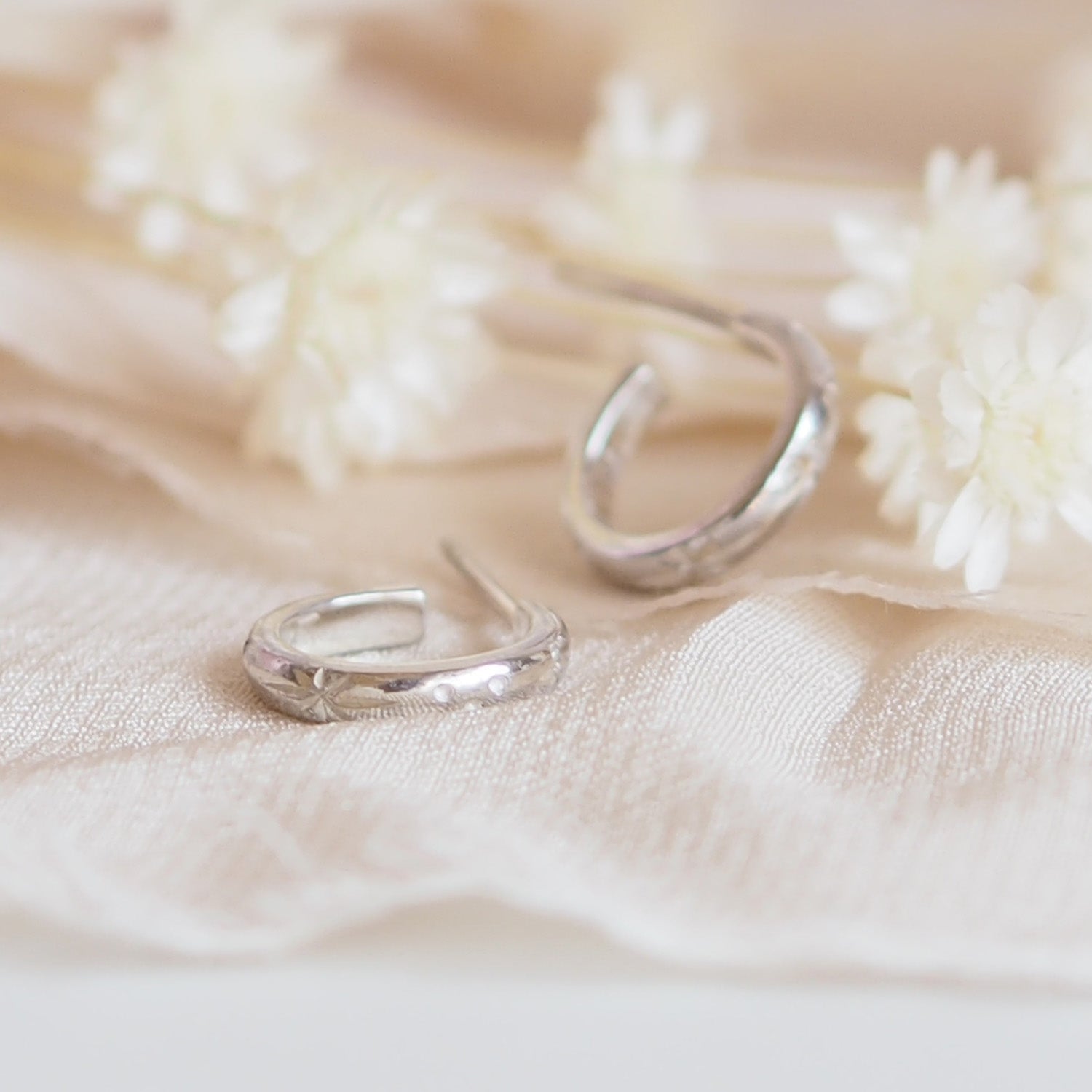 Hand Engraved Star Huggie Hoop Earrings in Sterling Silver